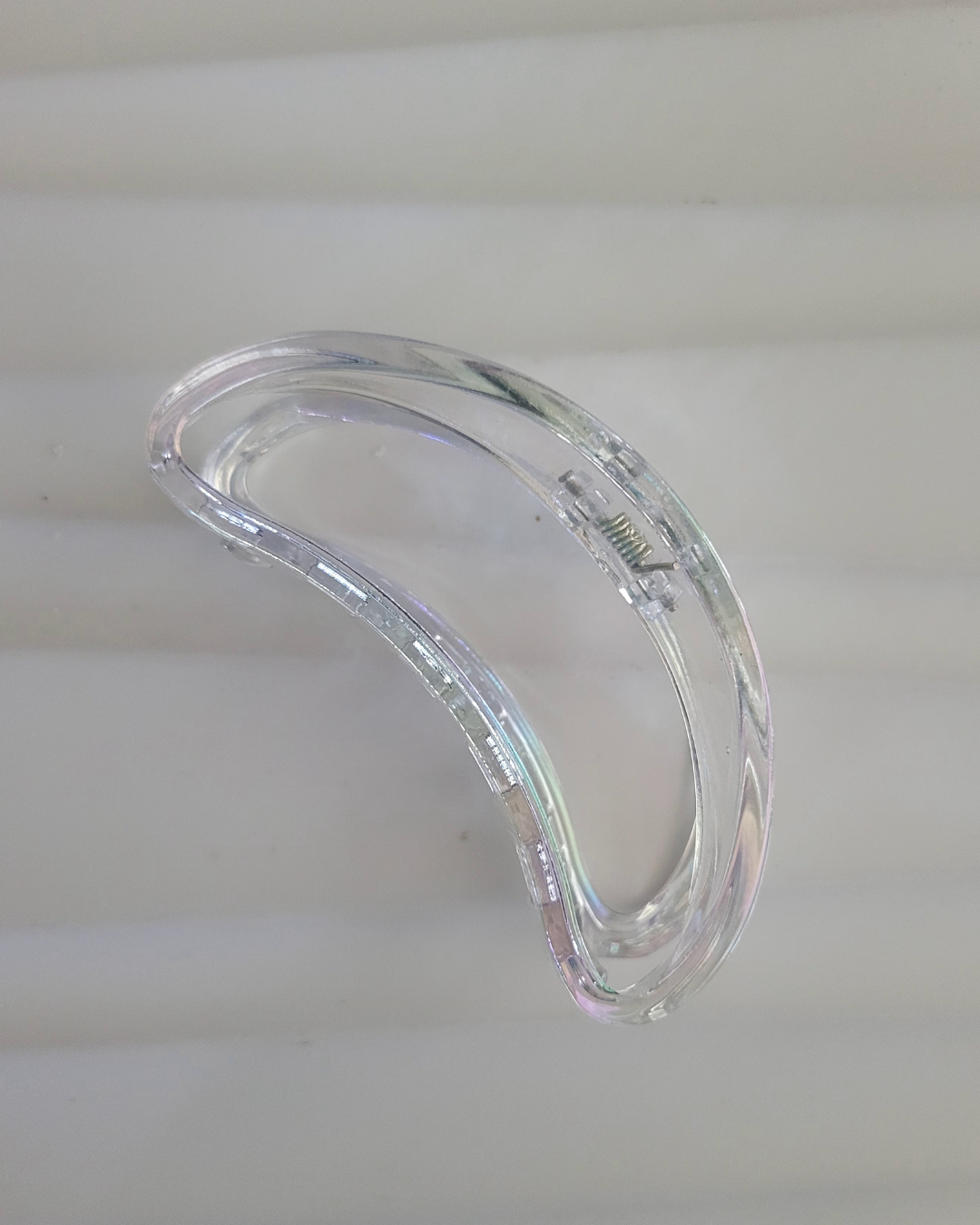 Osean iridescent claw clips styled with coastal accessories